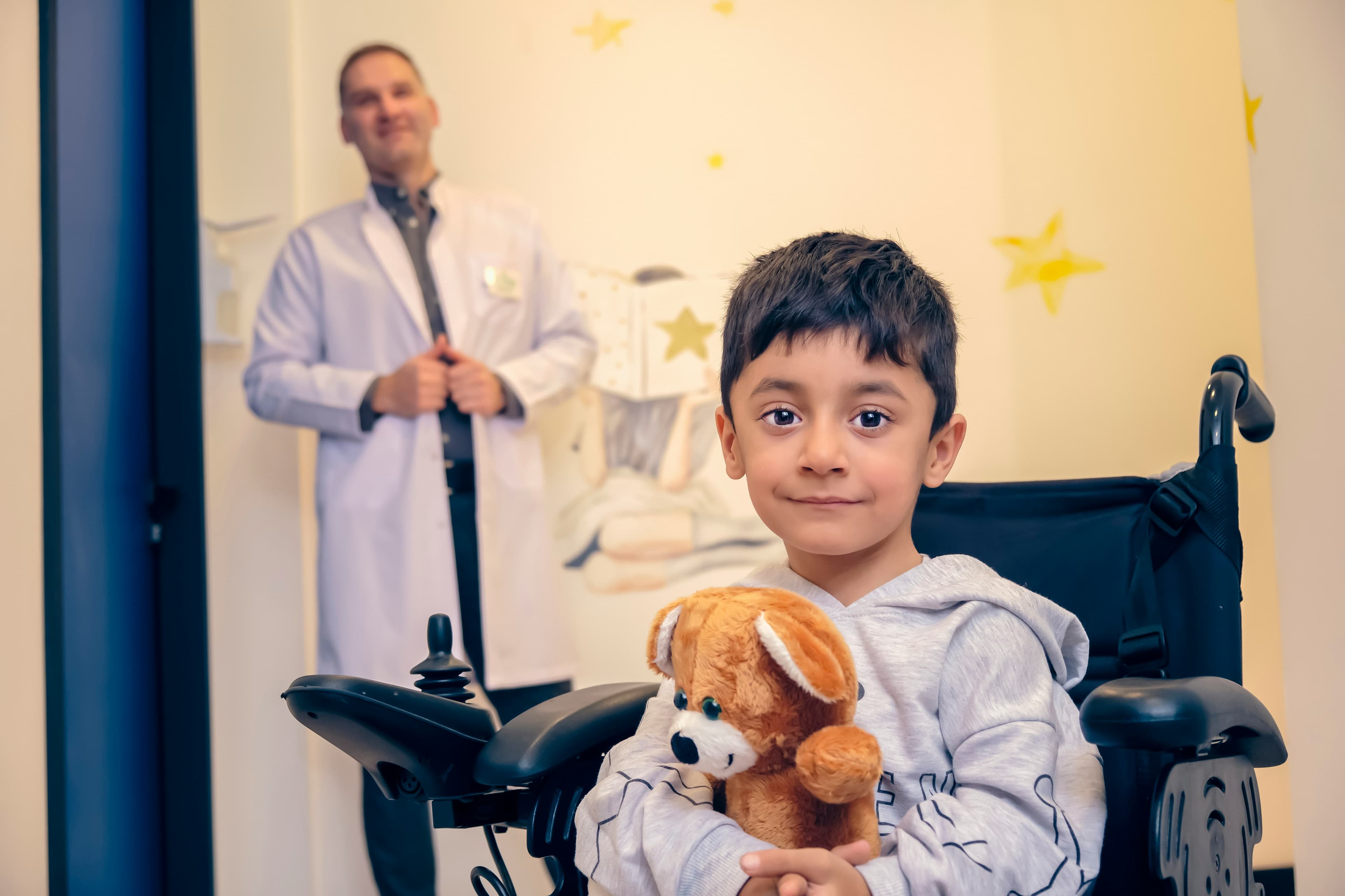 Dentist pointing to dental scan