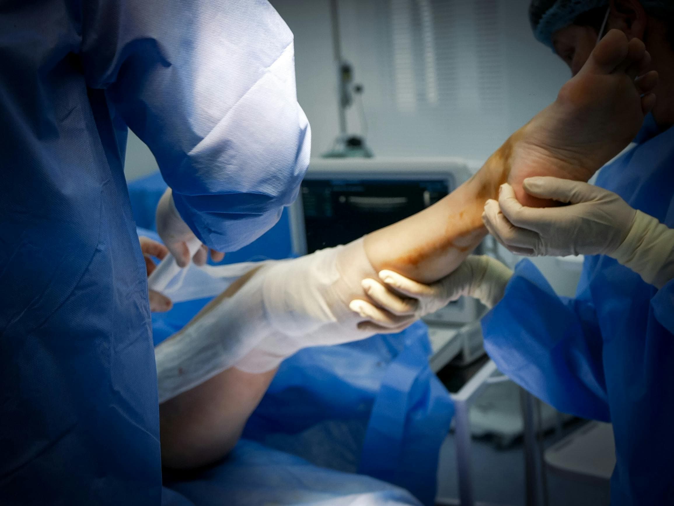 Dental professionals performing procedure